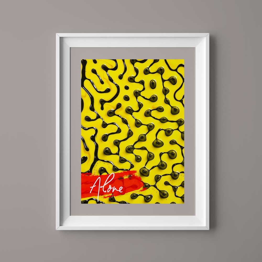 Framed abstract art with yellow and black patterns and a red signature.